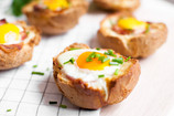 Egg-Stuffed Bread Bowls Egg-Stuffed Bread Bowls